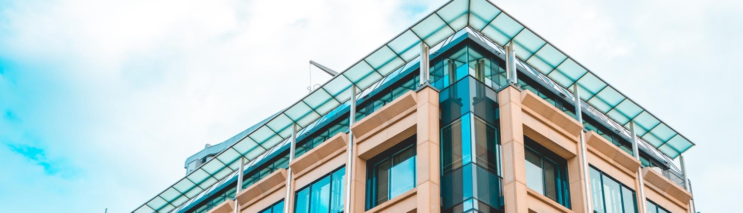 Side view of a commercial building on a cloudy day