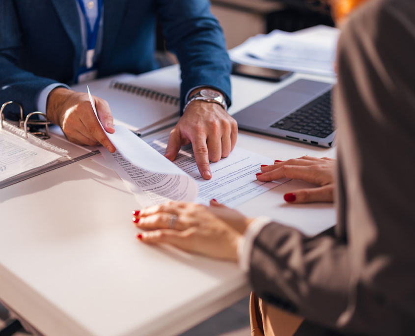 Commercial Real Estate Agent Going Over Contract
